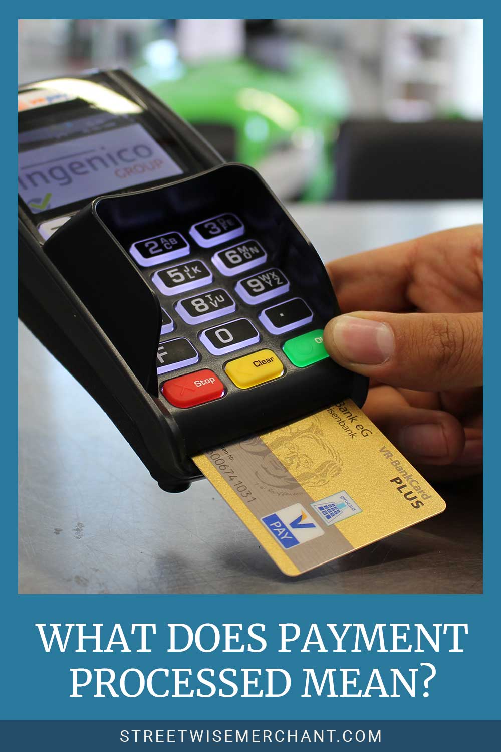 Someone holding a credit card machine and a card in it - What Does Payment Processed Mean?
